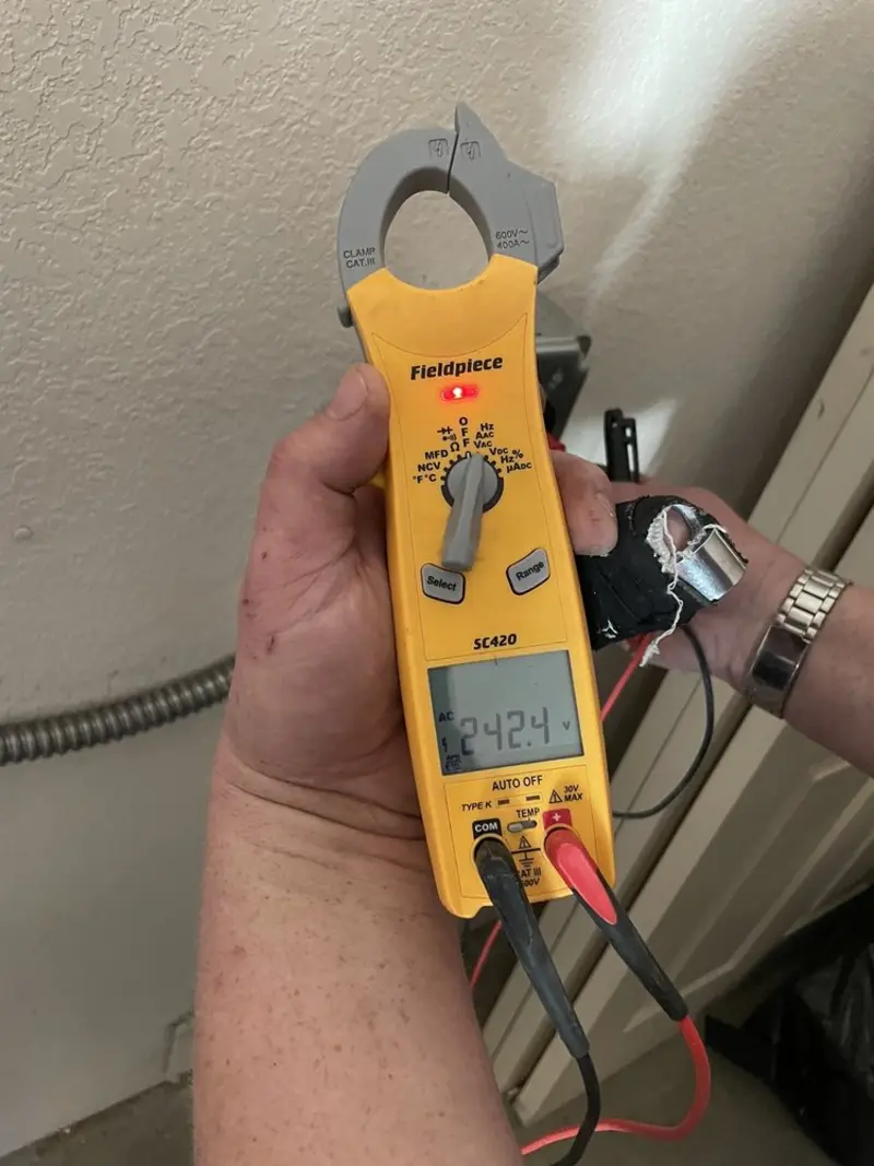 Voltage testing with clamp meter during Generator Installation in County Center
